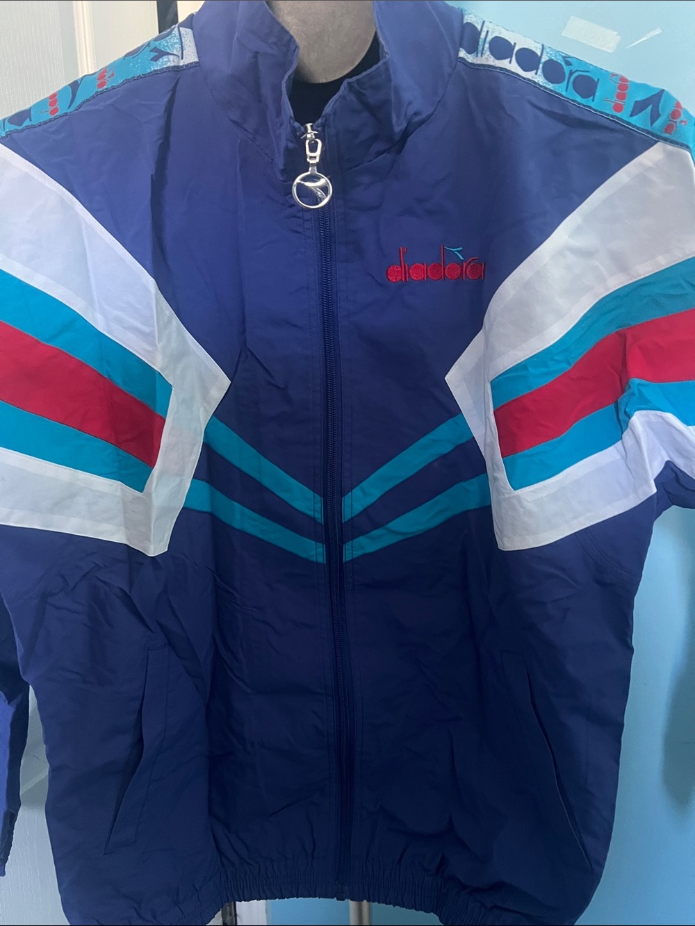 Diadora Navy Jacket with Teal, Red & White Stripe Accents